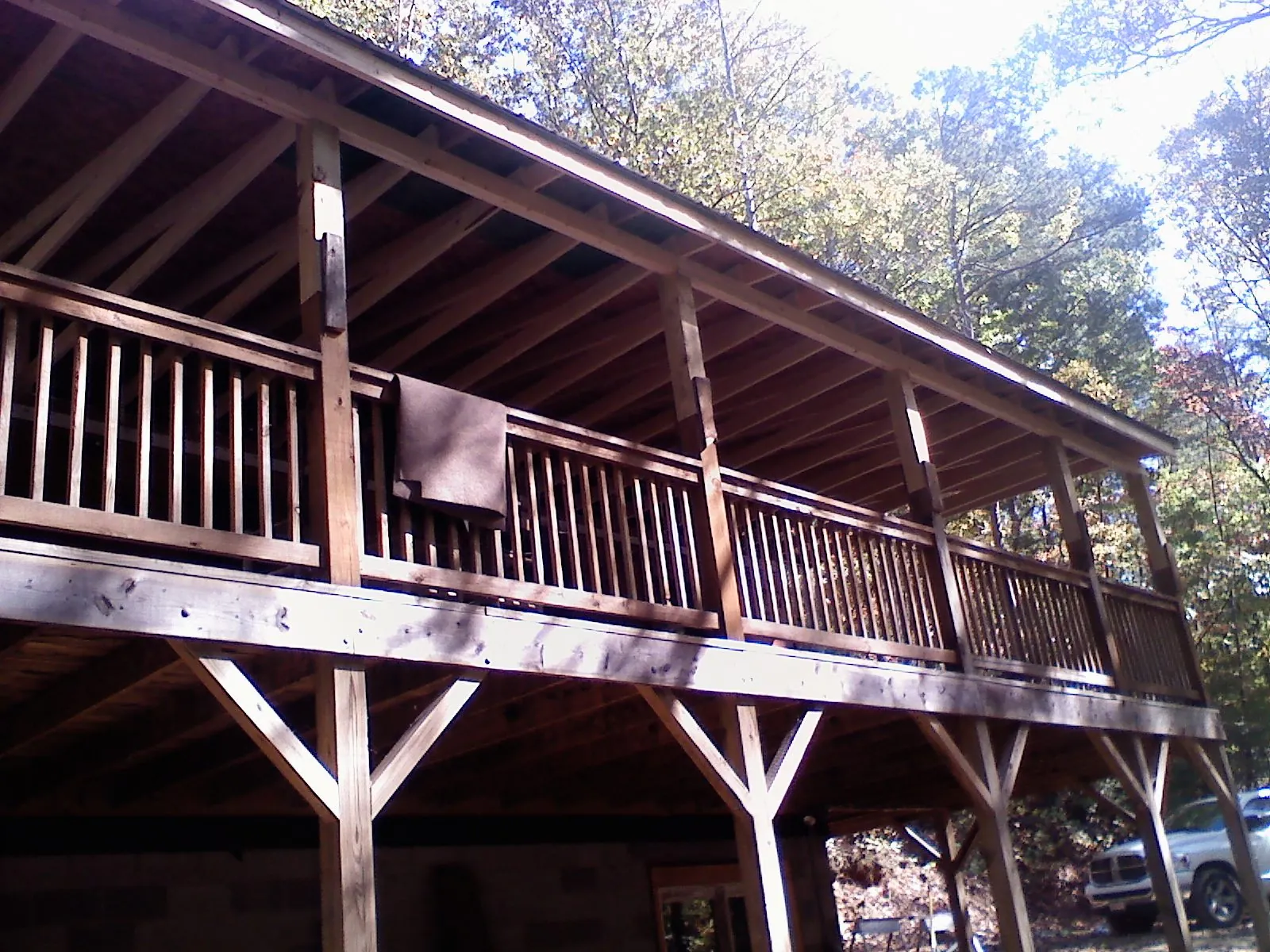 Timber framing under a new elevated porch and deck — Roof Leak Repair in Madrid by Roofing Brothers